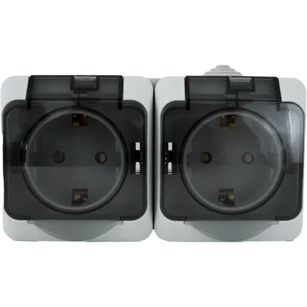 фото Розетка двойная накладная влагозащищённая schneider electric этюд с заземлением с крышкой и шторками ip44 цвет серый